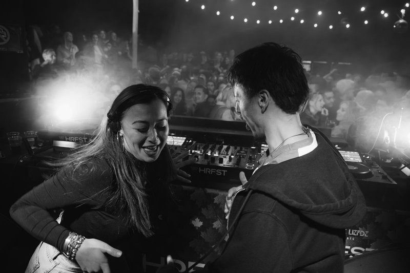 Demi and Robin laughing together on stage at HRFST